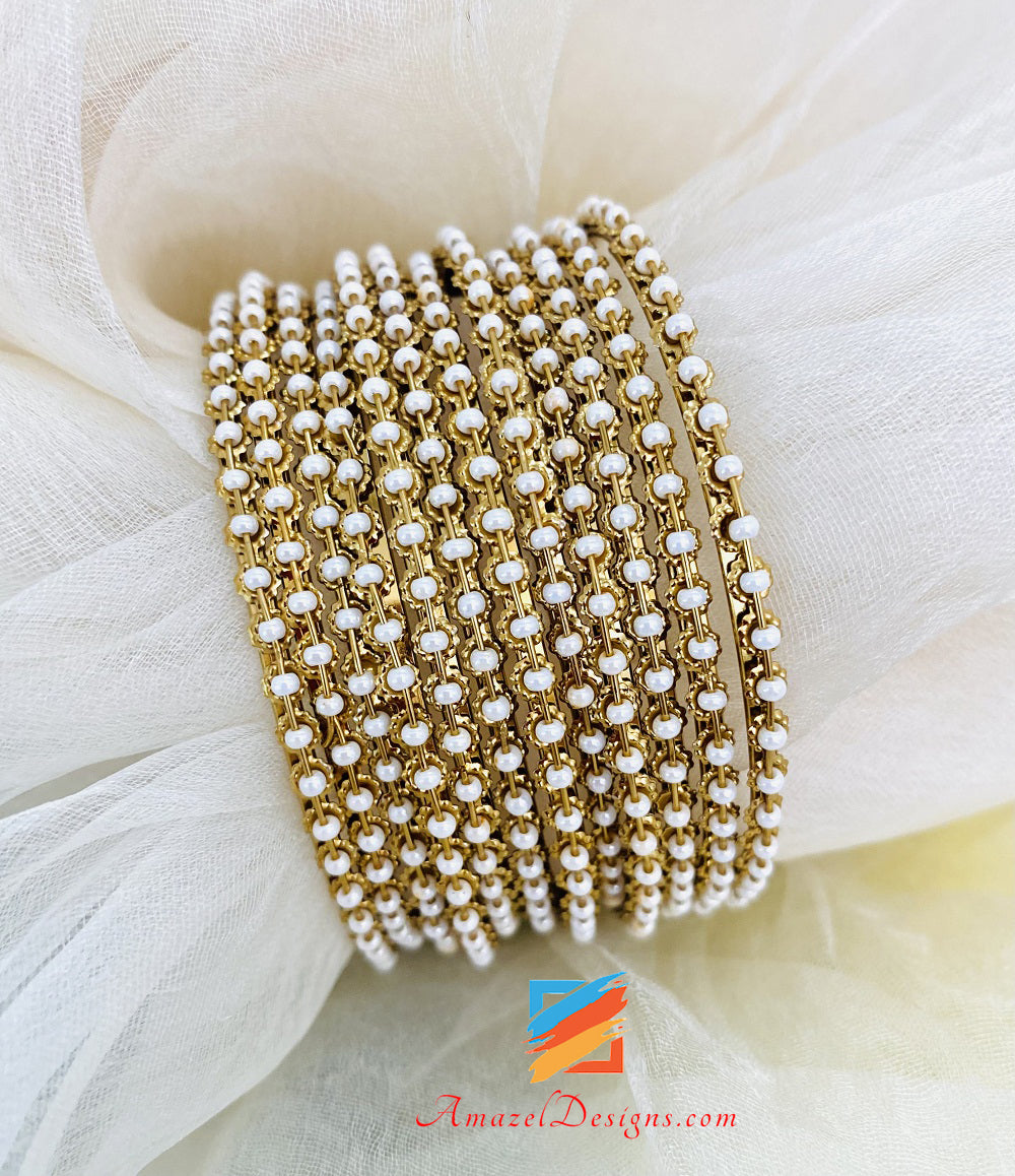 Braccialetti con perline bianche