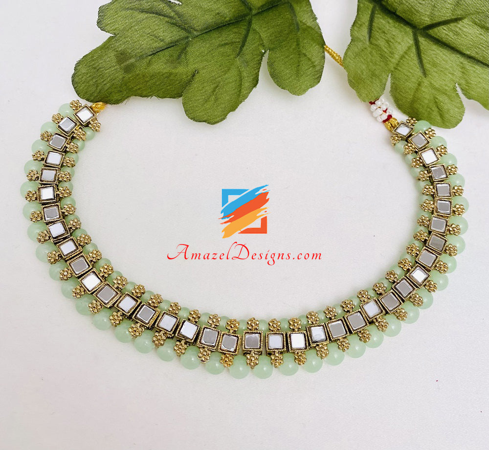 Set Tikka con orecchini a bottone con collana girocollo a specchio