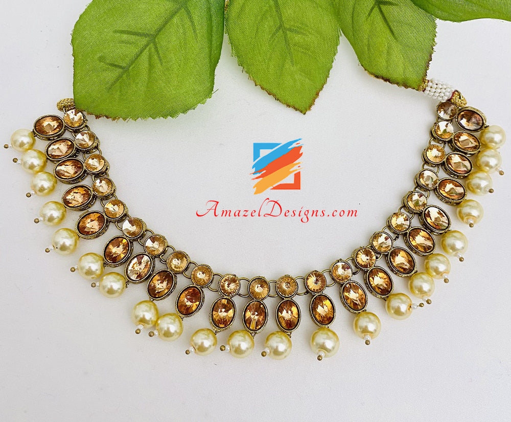 Set collana di perline bianco sporco color champagne