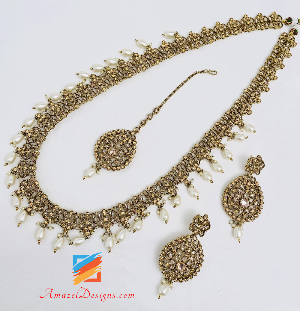 Set di orecchini Tikka con polki lunghi color champagne