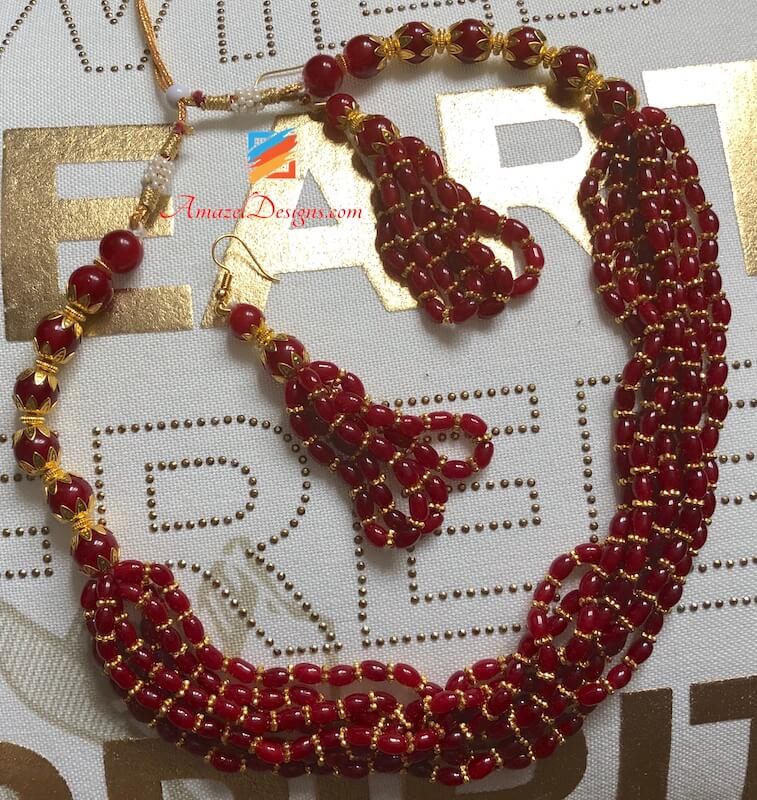 Elegante set Mala rosso e dorato