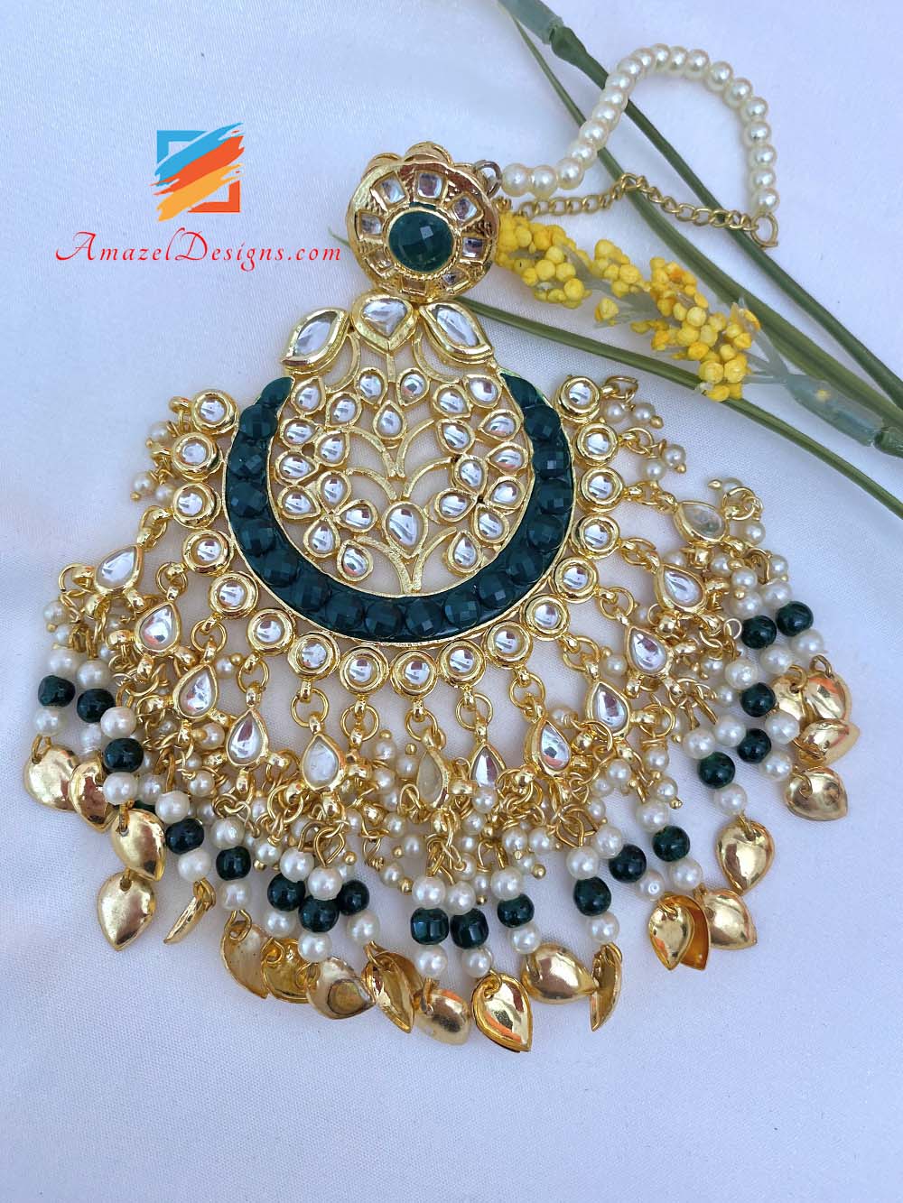 Green Kundan Pippal Patti Oversized Tikka And Earrings Set