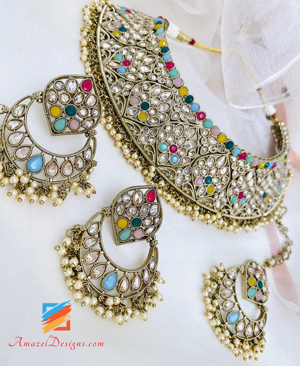 Set di orecchini Tikka con collana flessibile a pois multicolore
