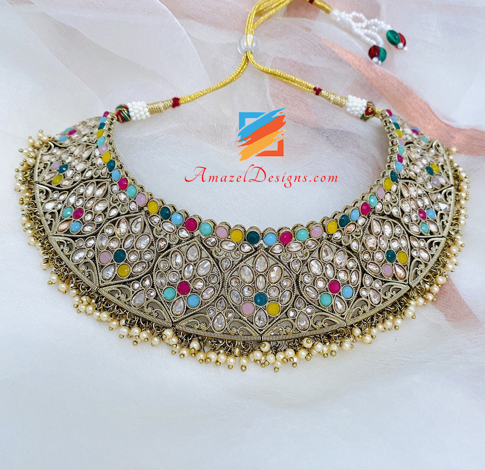 Set di orecchini Tikka con collana flessibile a pois multicolore
