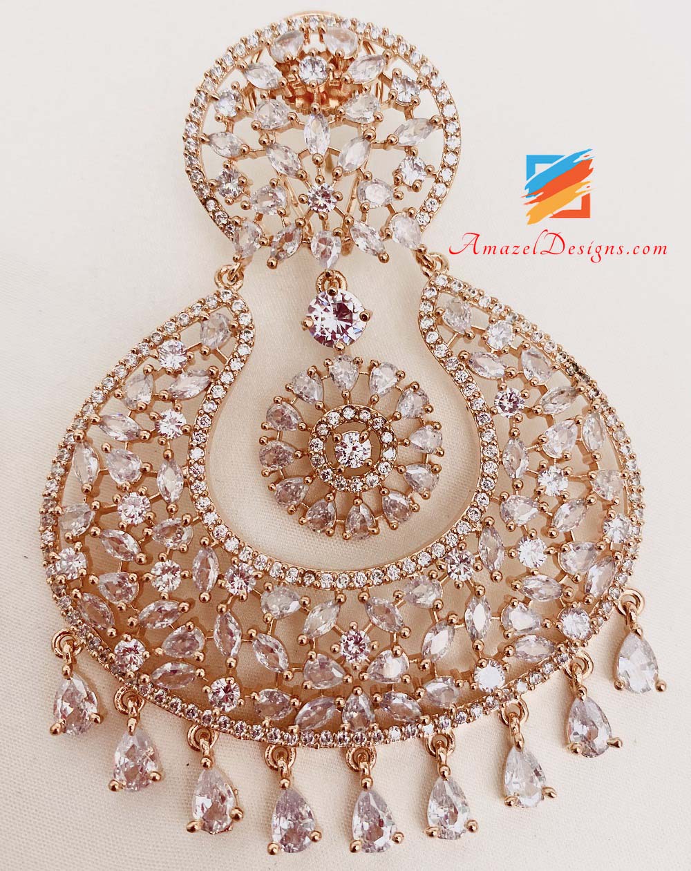 Orecchini Tikka in oro rosa con diamanti americani (AD).
