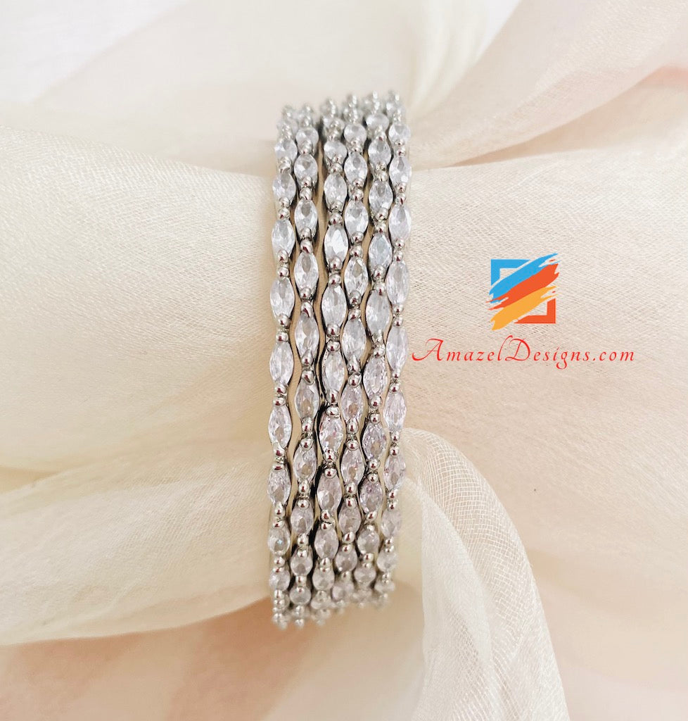 Braccialetti ovali con diamante americano (AD).