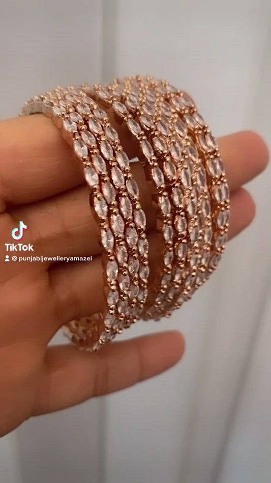 Braccialetti ovali con diamante americano (AD). 