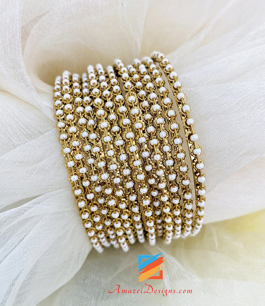 Braccialetti con perline bianche 