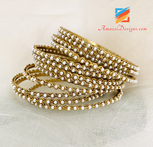 Braccialetti con perline bianche 