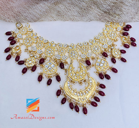 Maroon Ruby Golden Kundan Pendant Necklace Earrings Tikka Set