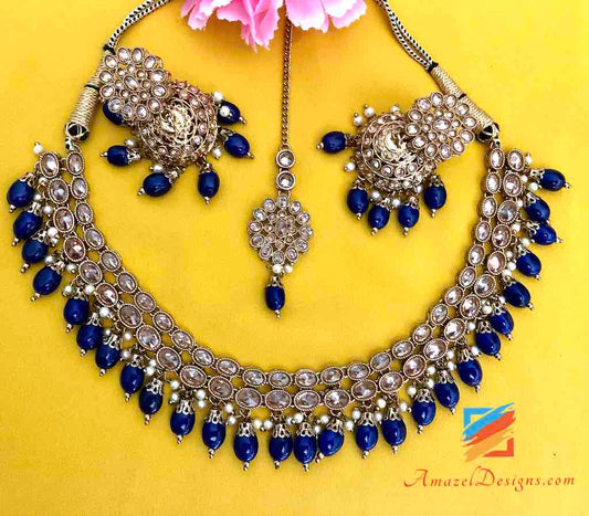 Polki Necklace with Blue Beads Jhoomkis Earrings and small Tikka set